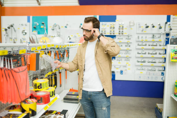 istock Construction worker shopping for new safety glasses 1417479533