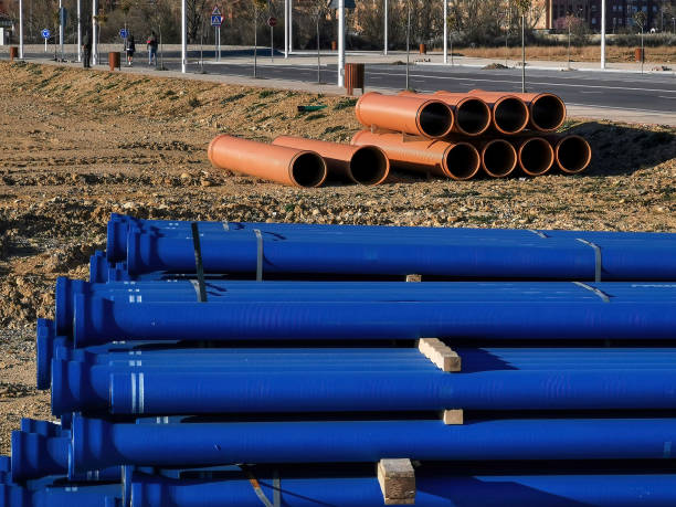 istock Stacked Plastic Pipes - Tuberias de material Plastico Apiladas 1417479697