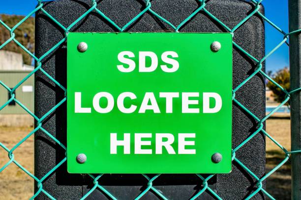 SDS Located Here Warning Sign View of a SDS Located Here Warning Sign at Emmaville, New South Wales, Australia speed limit sign australia stock pictures, royalty-free photos & images