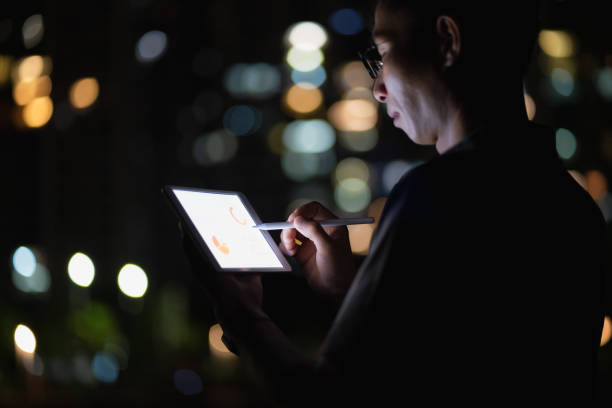 istock Close-up of man tapping tablet screen with electronic pen 1417482742