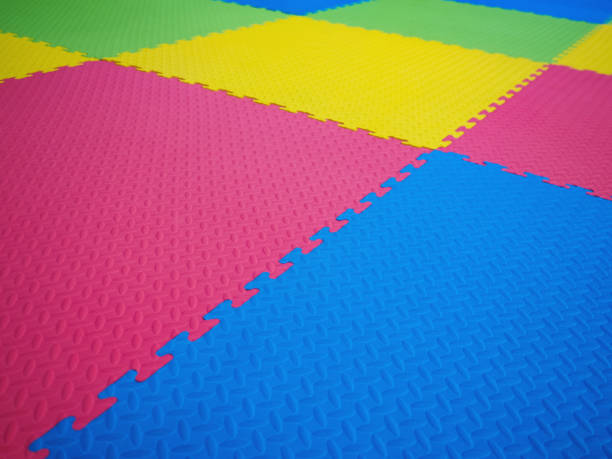 istock Colorful floor tiles in playground. 1417510126