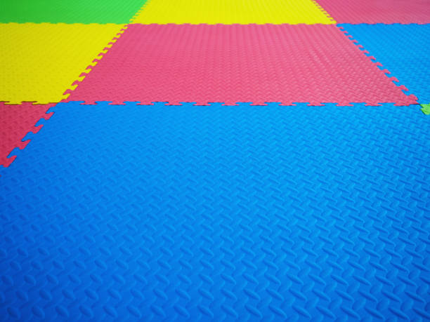 istock Colorful floor tiles in playground. 1417510127