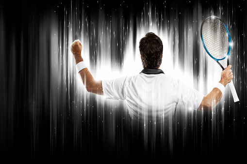 Tennis Player with a white uniform on a black and white background looking like a super hero.