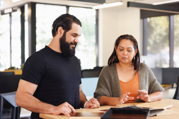 istock Male and female Aboriginal Australian designers collaborating 1417512655