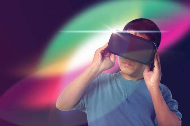 Man wearing VR virtual reality Headset virtual Global Internet connection metaverse. Glasses of virtual reality and exploring the metaverse. Technology, gaming, entertainment and people concept.