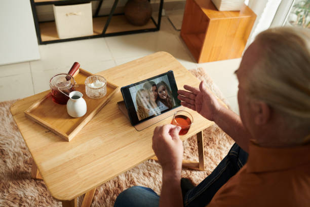 istock Senior man Video Calling Grandkids 1417519667