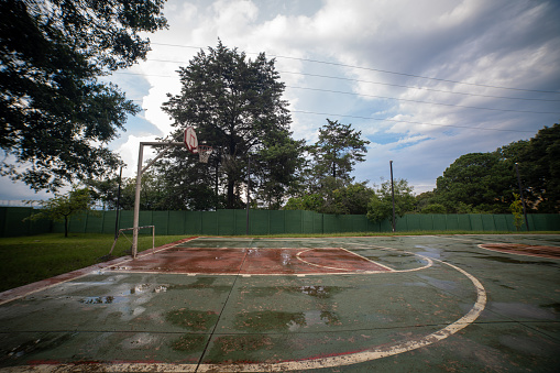 empty basketball court without people with a view of nature