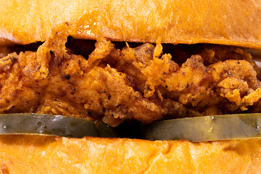 A crispy fried chicken sandwich shot close up