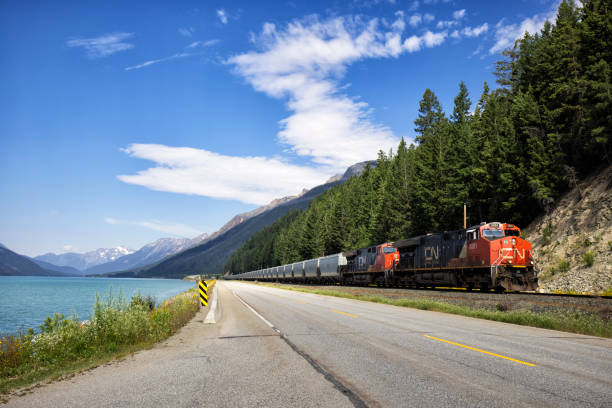 Moose Lake and CN Freight Train in Mount Robson Provincial Park, BC, Canada stock photo