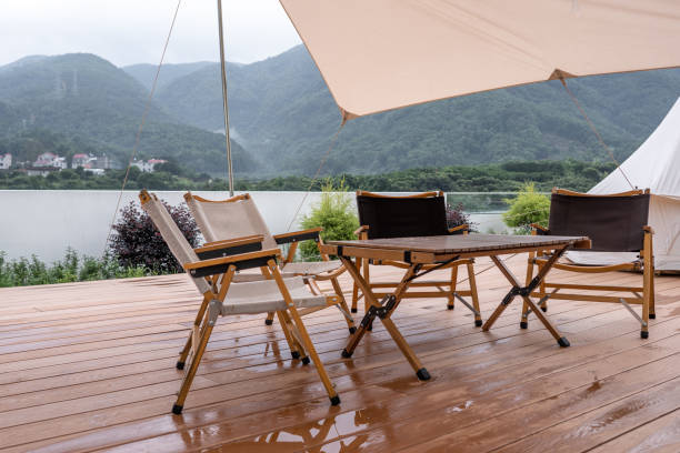 istock Rest tables and chairs beside the swimming pool 1417535085