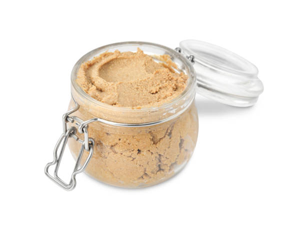 istock Delicious meat pate in glass jar isolated on white 1417540314