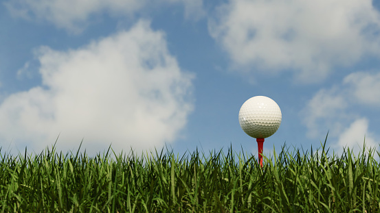3D Rendering: a white golf ball on a tee and green grass. ready for a shot. sports background concept. the texture of the golf ball with the blue sky background.