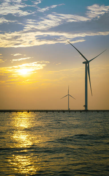 istock Wind power off the coast at sunset 1417545357