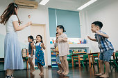Taiwanese female teacher teaches students to dance