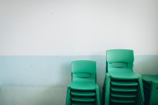 Place the chairs in the classroom