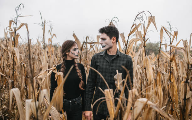 istock A young couple disguised as zombies in a cornfield for Halloween 1417555802