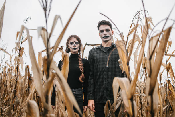 istock A young couple disguised as zombies in a cornfield for Halloween 1417555849