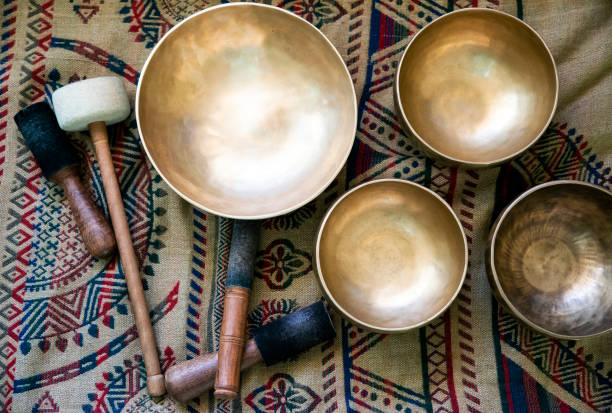 Accessories for sound massage. Tibetan singing bowls treatment stock photo