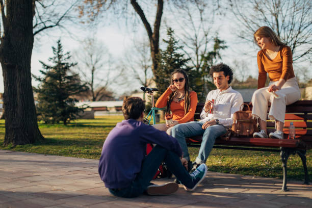 istock A multiracial  group of students enjoying the park during a sunny day 1417564724
