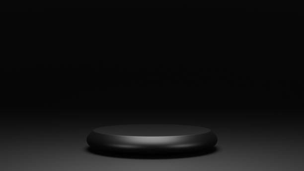 istock empty black podium display, minimal dark pedestal for product showcase, blank stage, 3D Rendering 1417565019