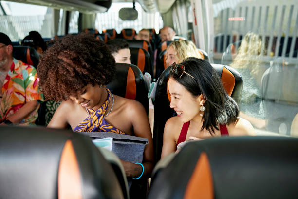 diverse group onboard motor coach before departure - bus coach bus travel tour bus imagens e fotografias de stock