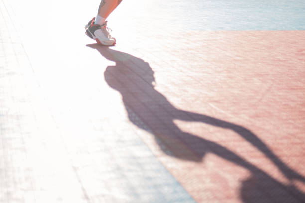 istock shadow of basketball player 1417565969