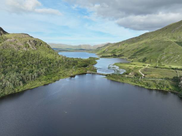 istock Scenery of a river surrounded by hills in Ireland 1417570651