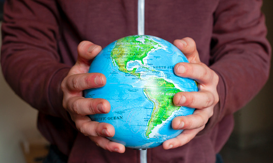 Earth holding in human hands (http://www.mappery.com/map-of/World-Map-12)