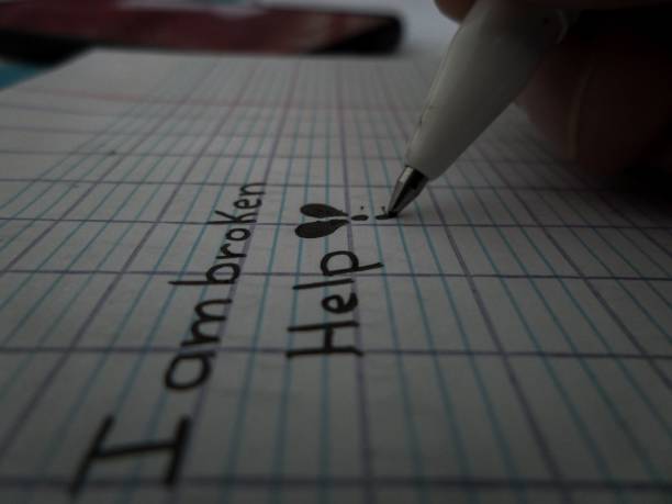 istock Closeup shot of a pen writing 