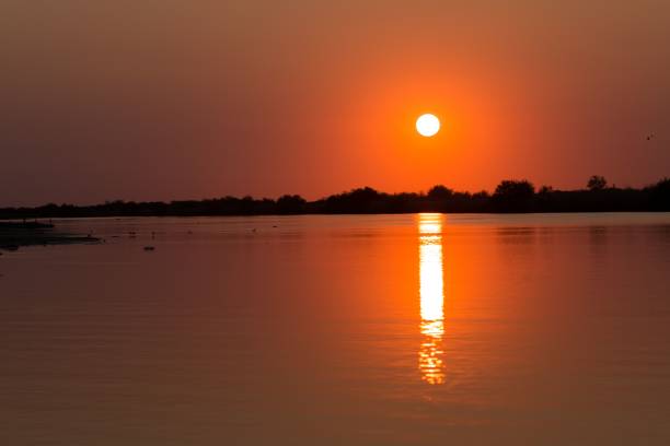 istock Beautiful view of sunset at Cubango River 1417573866