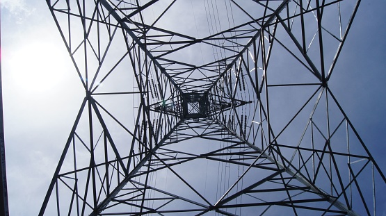 Inside if a high voltage power line tower