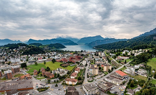 An aerial drone footage of the Lake Lucerne in distance, Central Switzerland