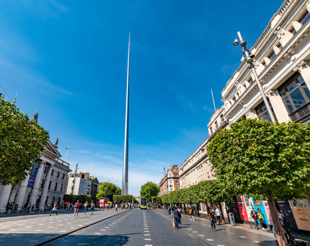 Dublin, Ireland - August 3, 2015: The Spire of Dublin also known as Spike is a large, 121.2 metres tall stainless steel pin-like monument located on the O'Connell Street in Dublin, Ireland