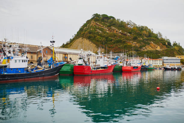 Fishing boats in port of Getaria, Basque country, Spain stock photo