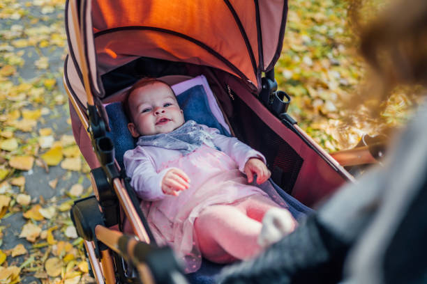 istock Adorable baby girl in a stroller 1417587329