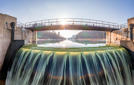 Long time exposure of the river Aare at the hydroelectric power plant Hagneck at the lake Biel in Switzerland