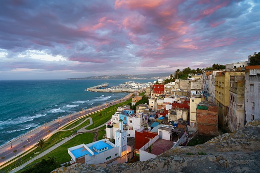 An aerial view of cityscape Tangier surrounded by buildings and water