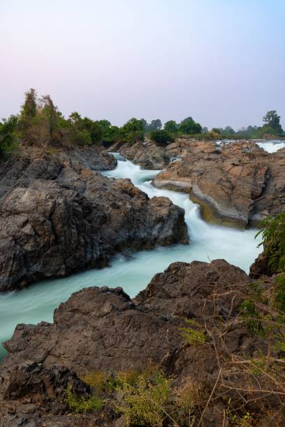 istock Vertical of Li Phi Waterfall in Mekong delta, Laos shot in long exposure 1417594702