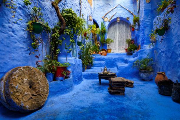 Beautiful shot of a staircase leading to an arched door in Chefchaouen, the Blue Pearl of Morocco A beautiful shot of a staircase leading to an arched door in Chefchaouen, the Blue Pearl of Morocco chefchaouen stock pictures, royalty-free photos & images