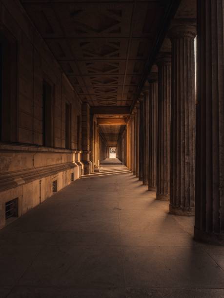 istock Vertical shot of an empty concrete walkway with columns 1417597867