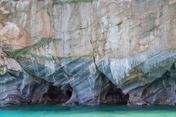istock Rocky cliff overseeing the blue ocean on a sunny day 1417598137