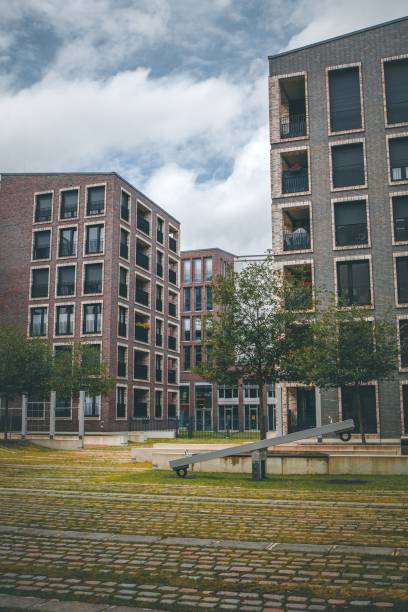 istock Vertical shot of a residential complex with the sky background 1417598739
