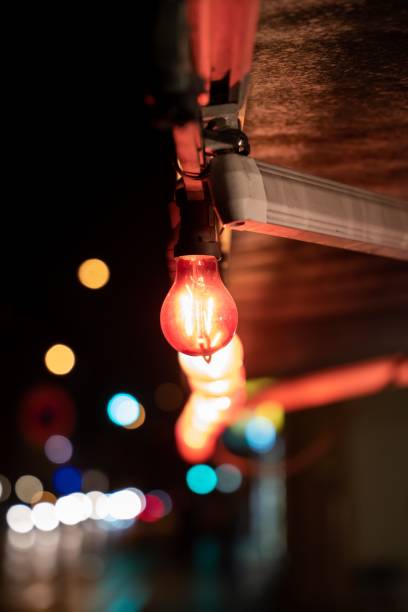 ボケ背景の電球 - lighting equipment defocused street light city ストックフォトと画像