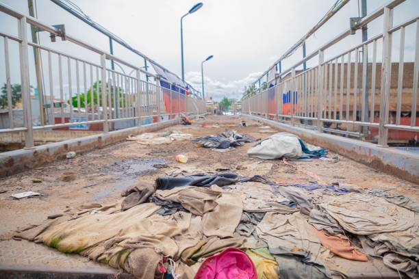 istock Dirty polluted bridge with old clothes on the ground 1417599674