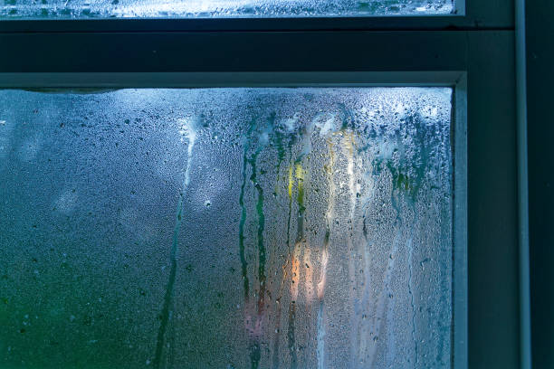 istock Condensation on the inside of a window in a cold damp house. 1417600008