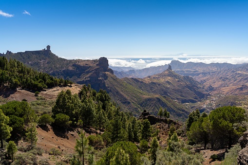 A landscape view of Roque Nublo under blue sky in Gran Canaria, Canary Islands