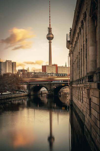 Beautiful view of the Bode museum and the Berlin TV Tower in sunset A beautiful view of the Bode museum and the Berlin TV Tower in sunset central berlin stock pictures, royalty-free photos & images