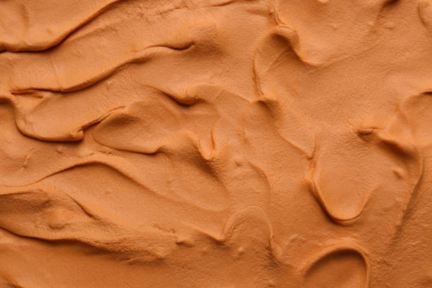 istock Brown play dough as background, top view 1417605592