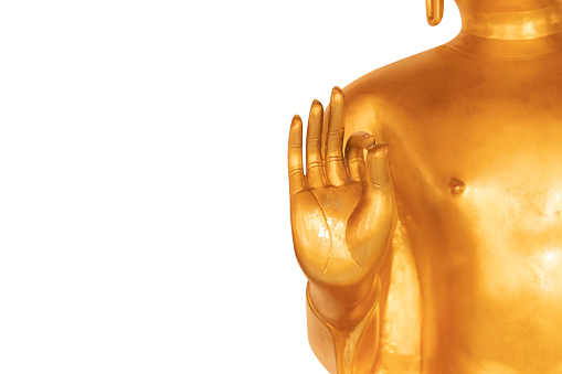 Golden Hand of Buddha Statue Isolated on a White Background