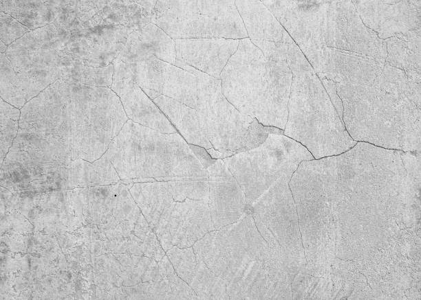 istock Old wall with cracked stucco as textured background 1417612335